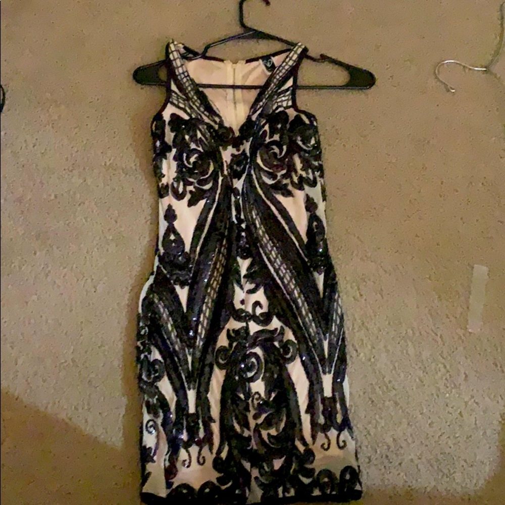 Nude dress with black sequins